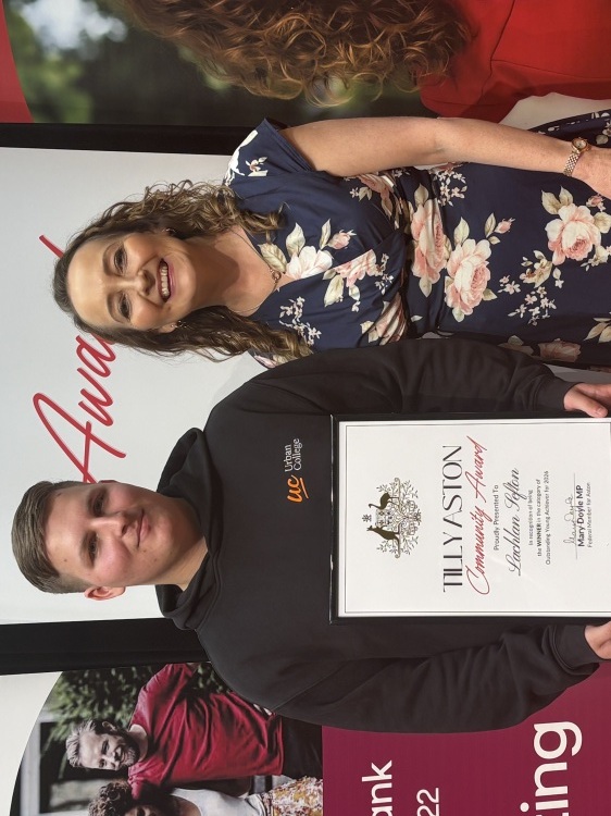 Lachlan with his Tilly Aston Community Award standing with Mary Doyle MP