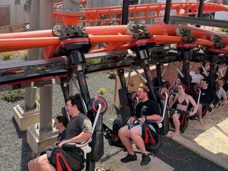 Students enjoying a thrilling roller coaster ride at Gumbuya World