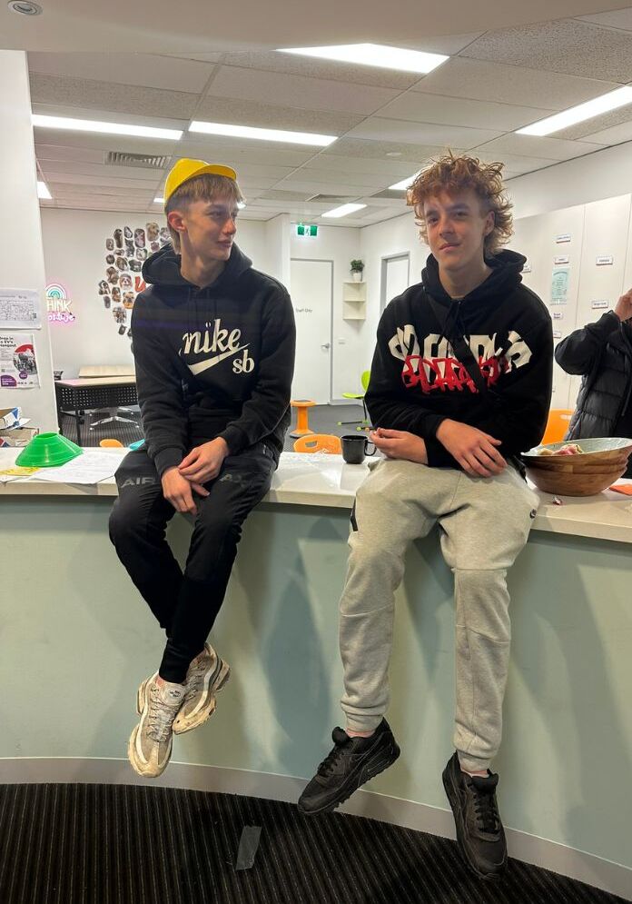 2 Students sitting college hub