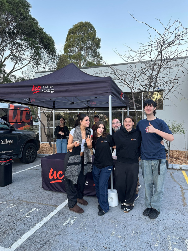 Student Enjoying the Sausage Sizzle