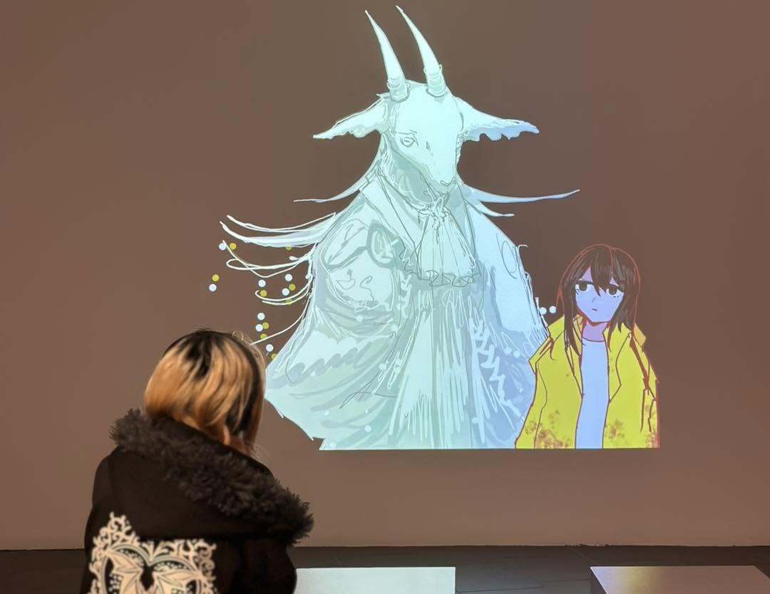 student studying art projection