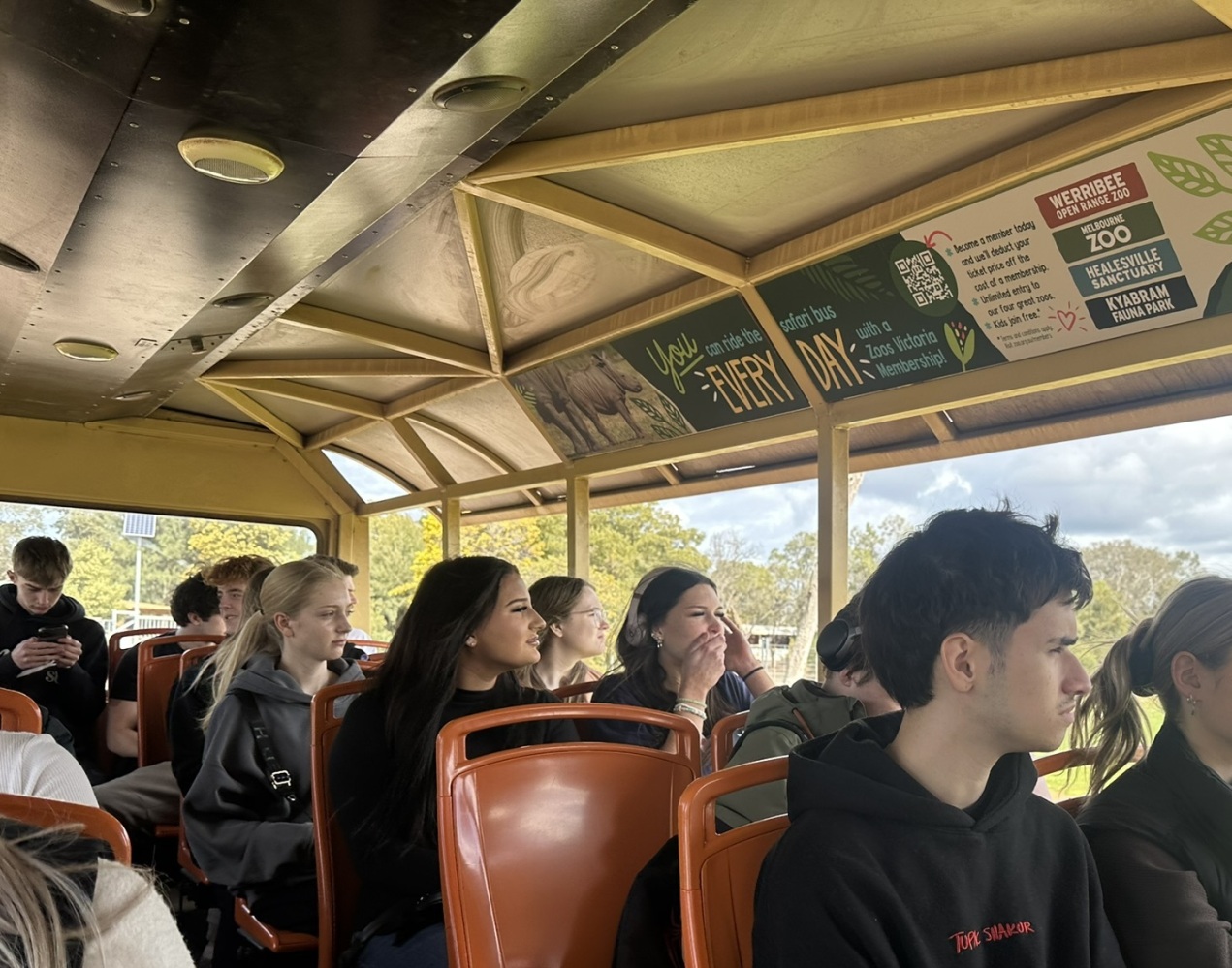 Group of students on safari tour at werribee zoo