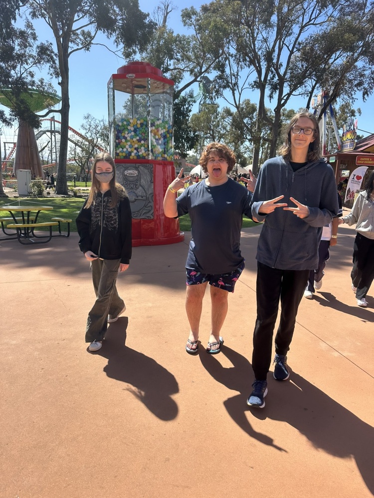 3 friends peace sign gumball machine