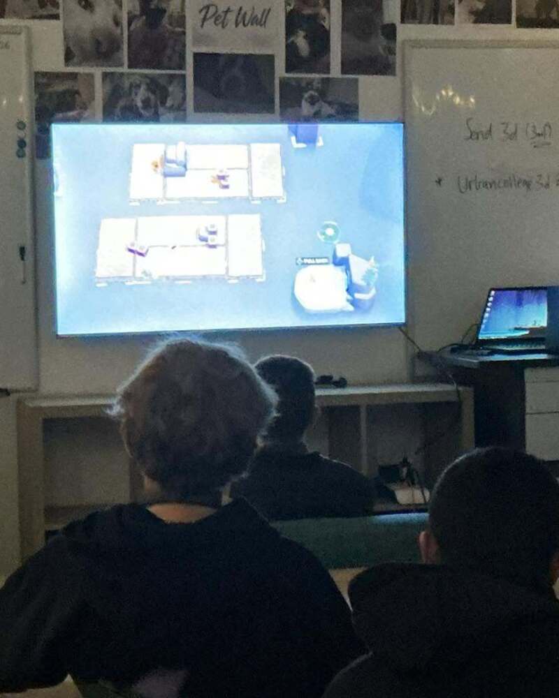 Students participating in a gaming activity during Wellbeing Day at Urban College
