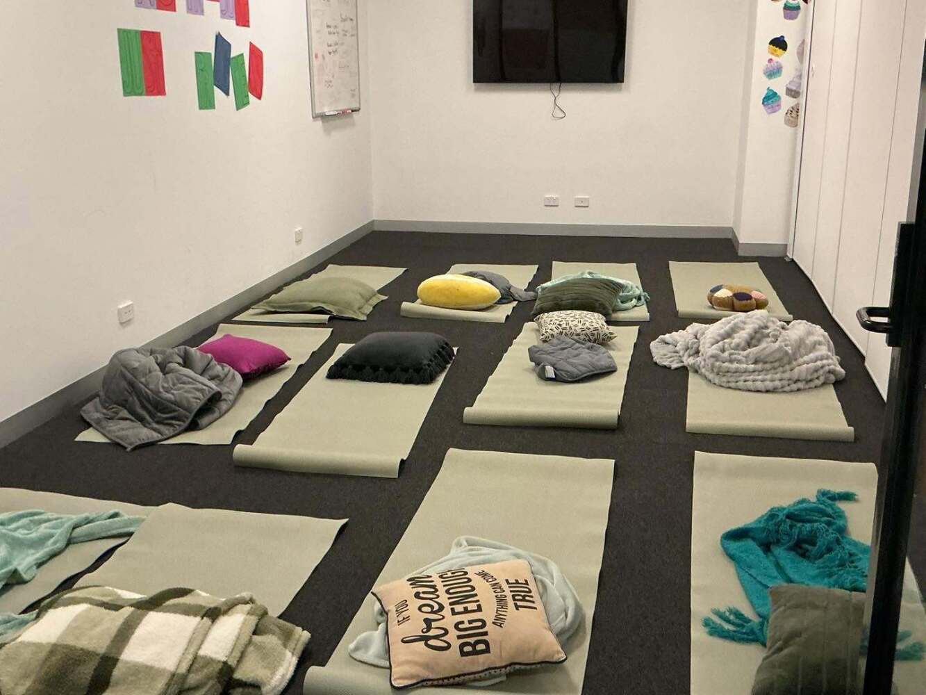 yoga mats and cushions on the floor
