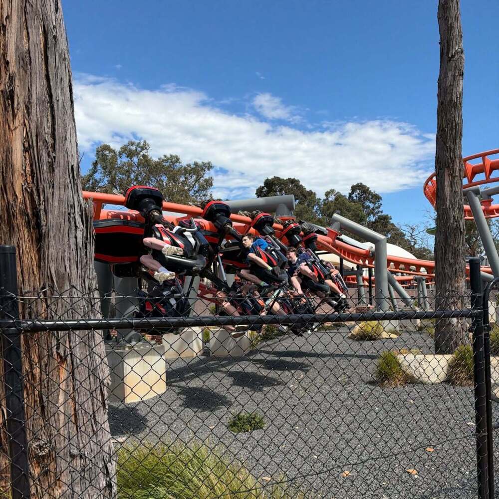 Students enjoying the suspended roller coaster at Gumbuya World